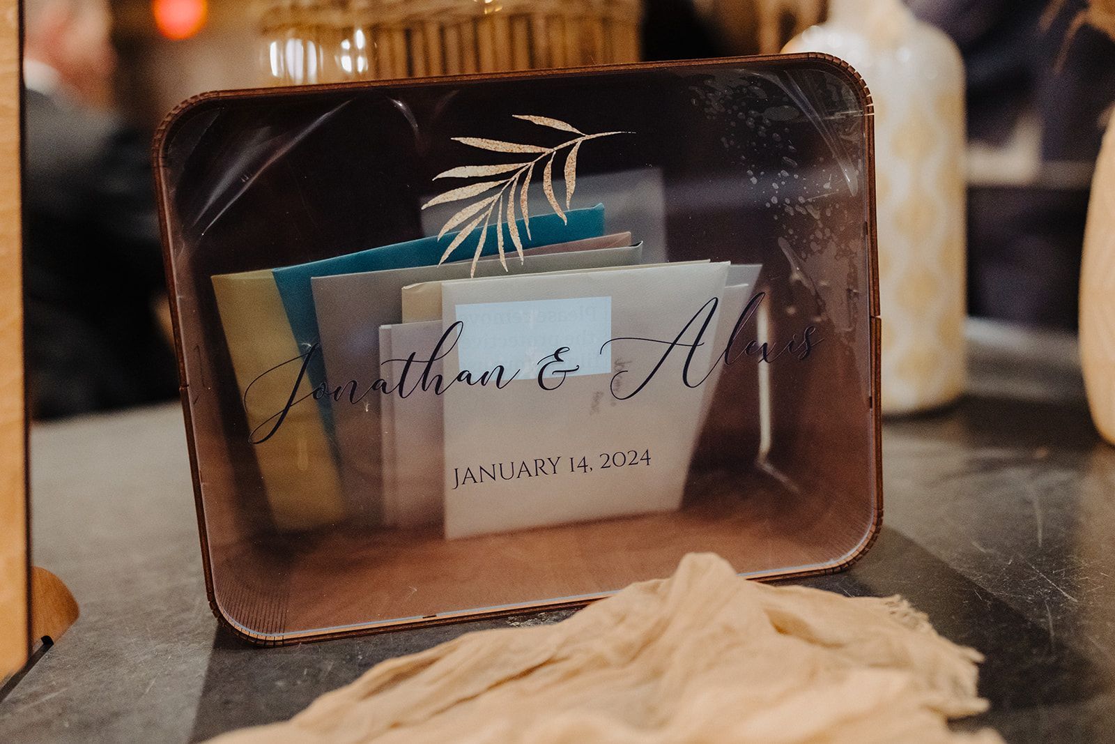 A box filled with envelopes and a card that says ' smith & a ' on it