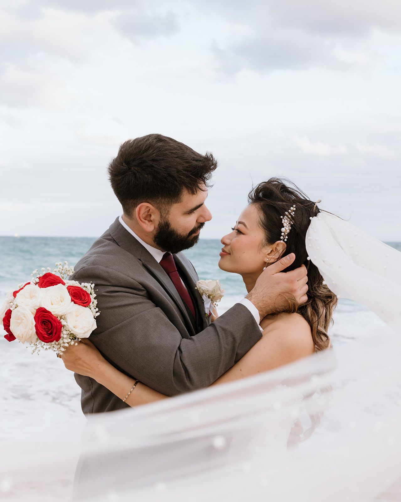 couple on the beach on their wedding day