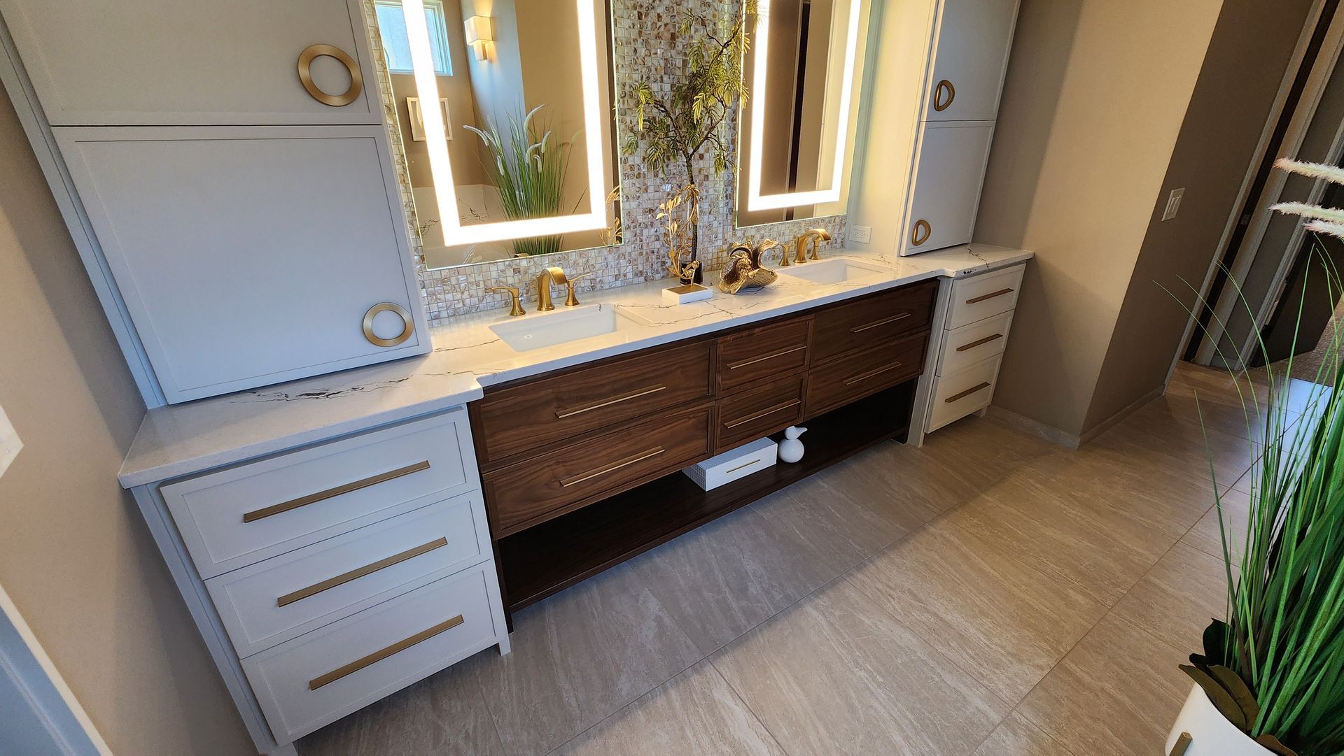 A bathroom with two sinks and two mirrors.