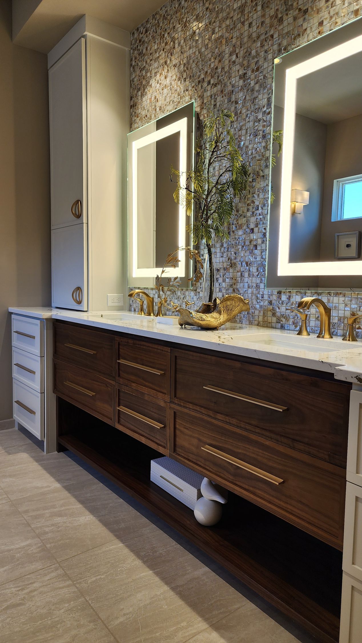 A bathroom with two sinks and two mirrors.