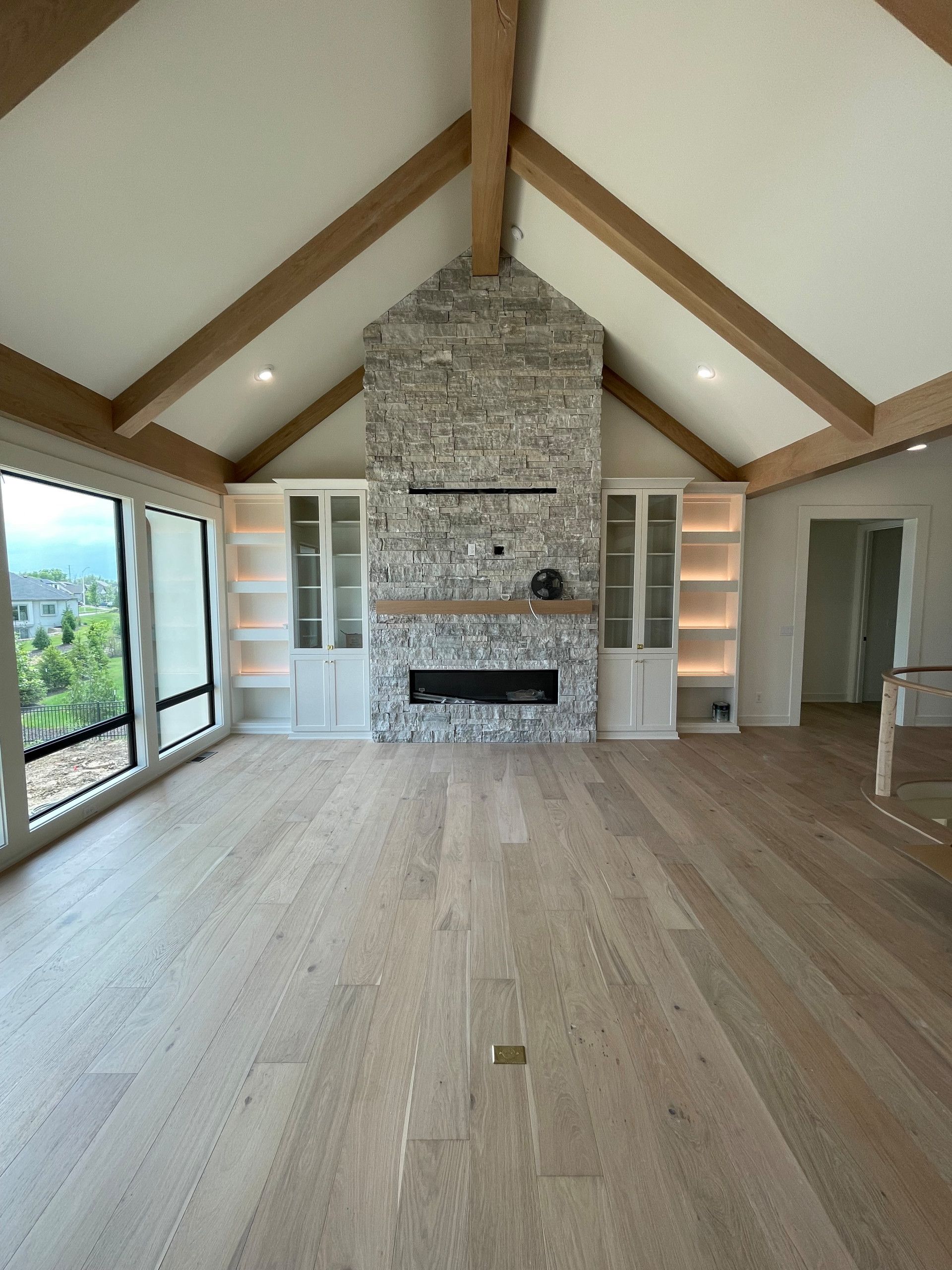 There is a fireplace in the middle of the room.