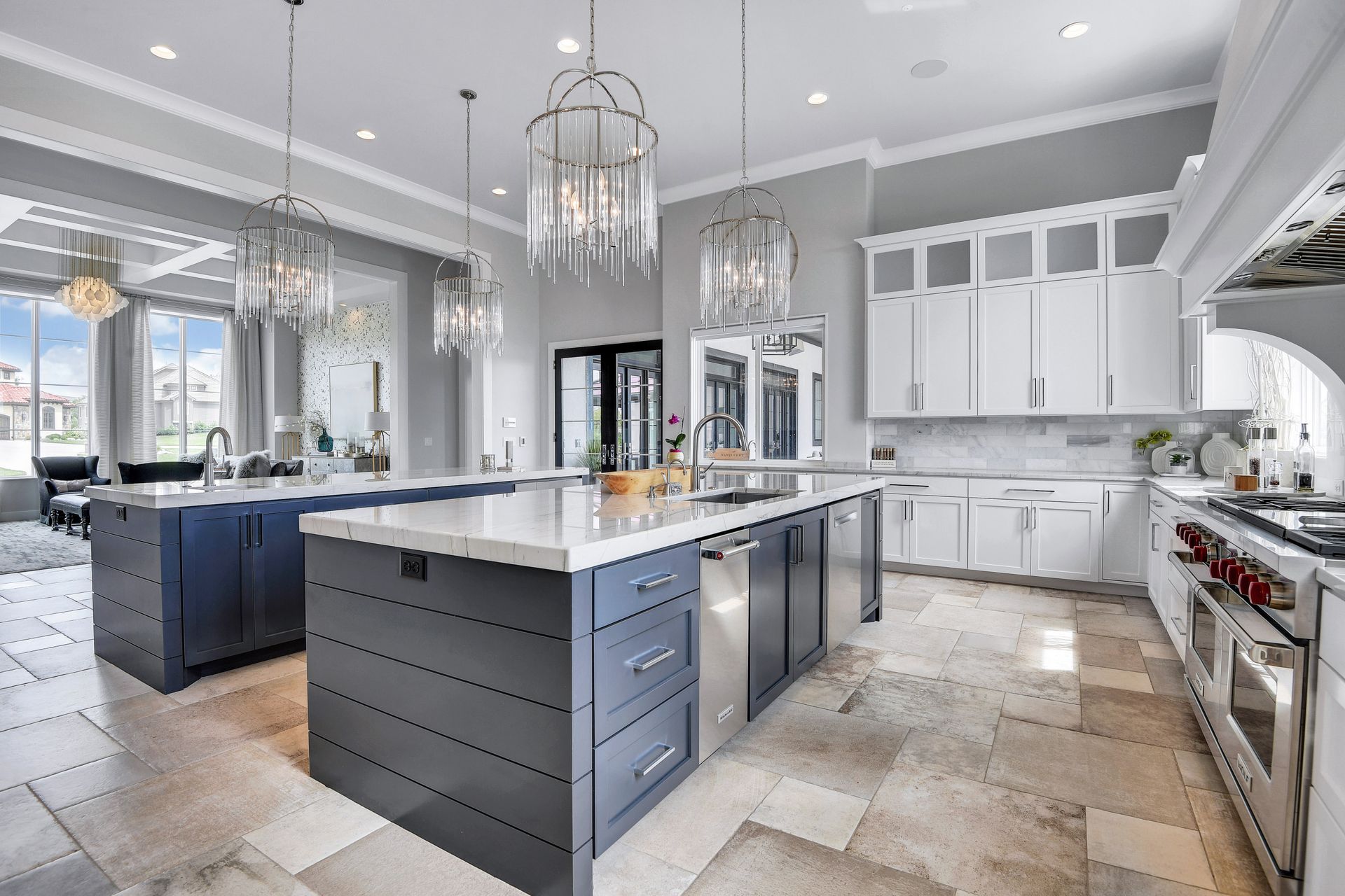 A large kitchen with a lot of cabinets and stainless steel appliances.