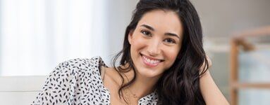 Happy young woman — Dental Care in Greenville, SC