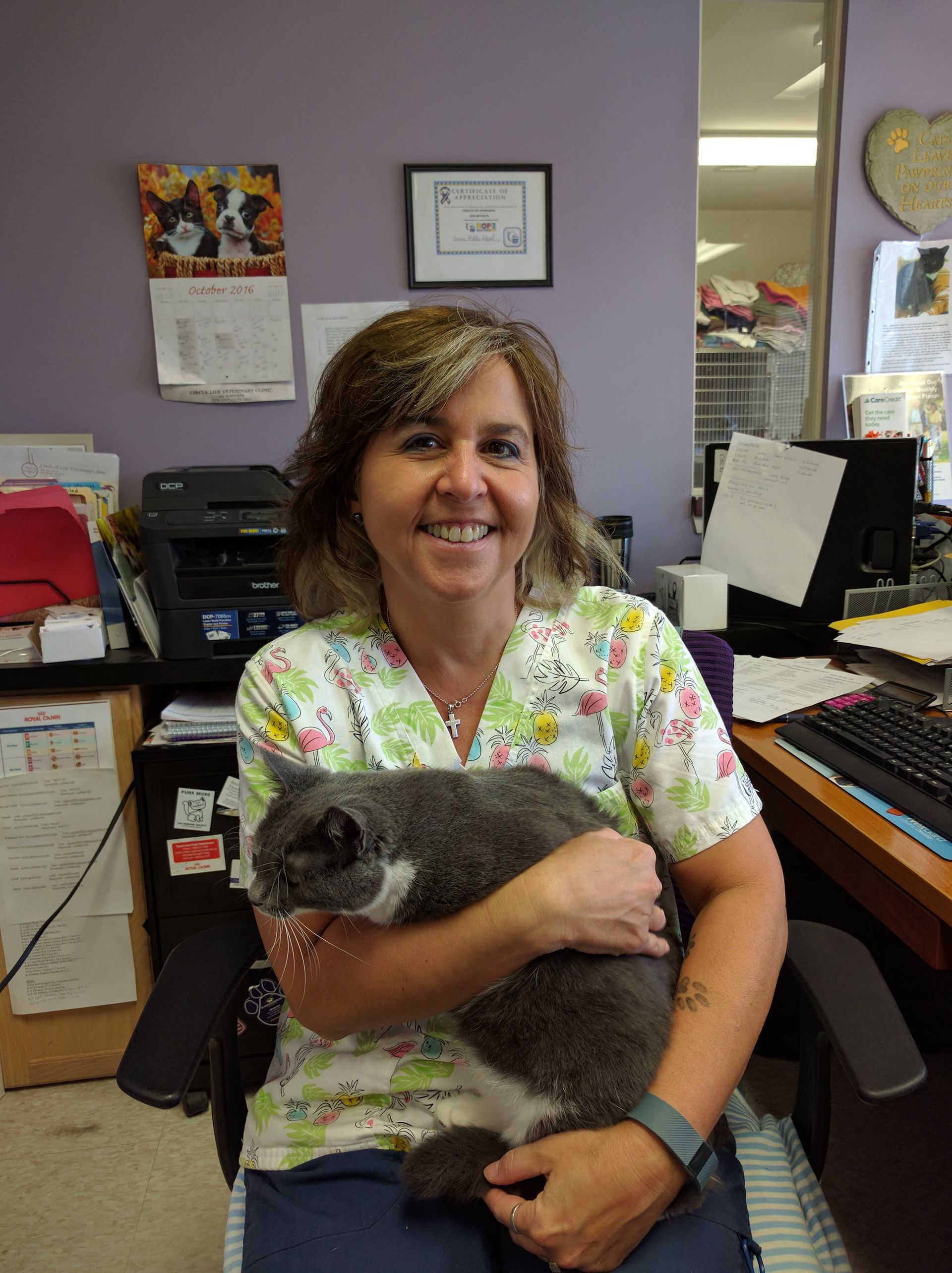 Image: Team member Vicki holding a cat
