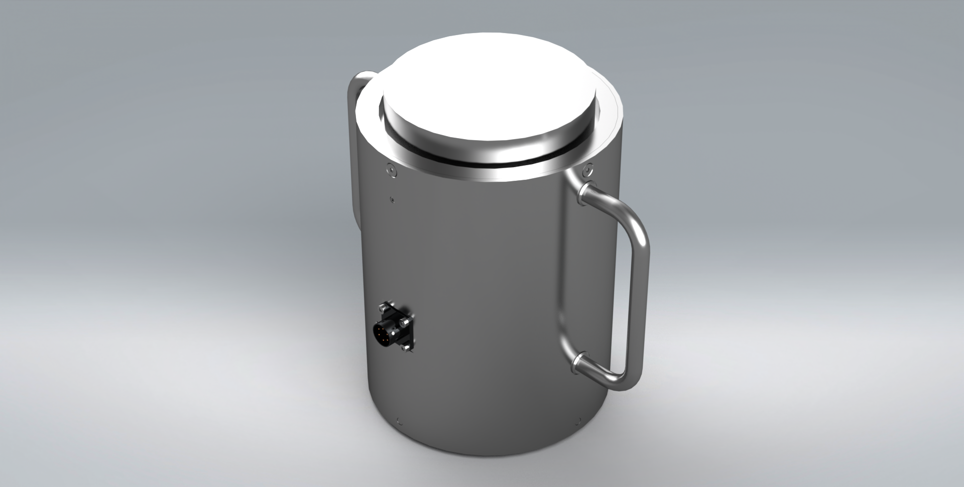 A stainless steel cylinder with a handle on a gray surface.