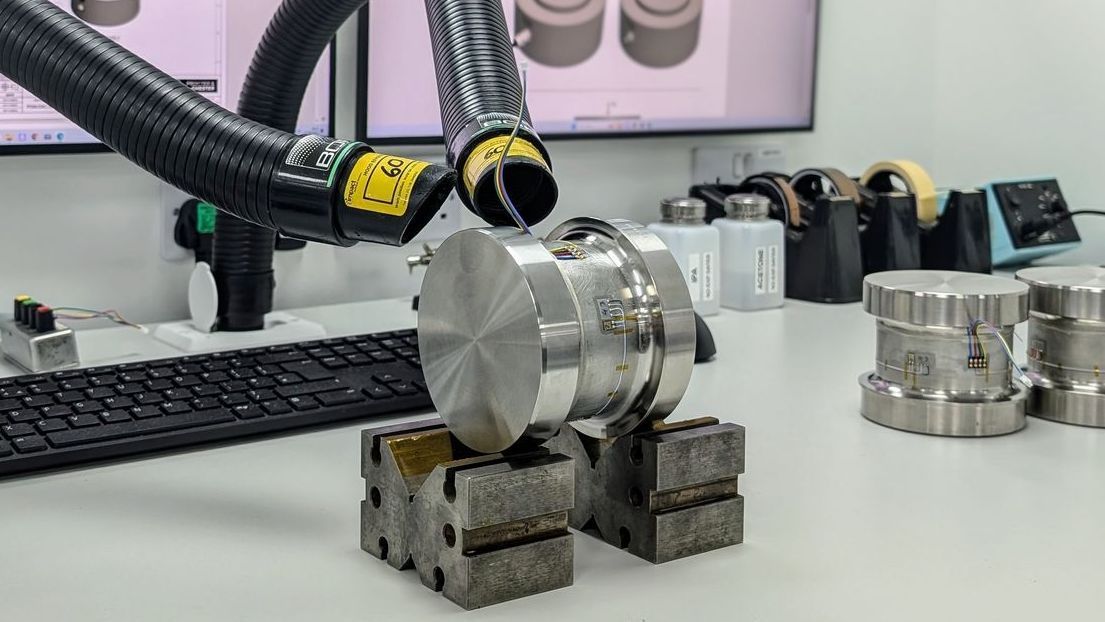 A high performance load cell being strain gauged and calibrated inside the UKAS accredited lab at Procter and Chester.