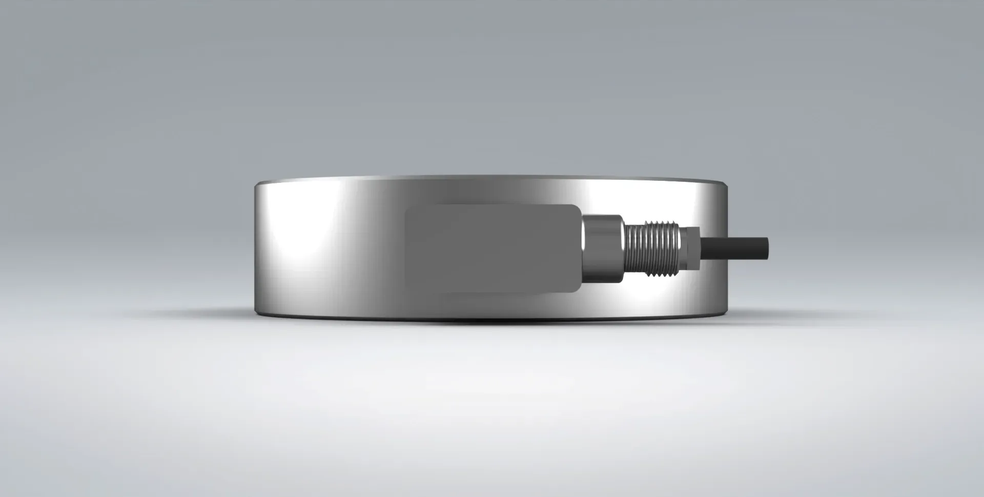TC4 pancake load cell on a grey background from Procter and Chester Measurements