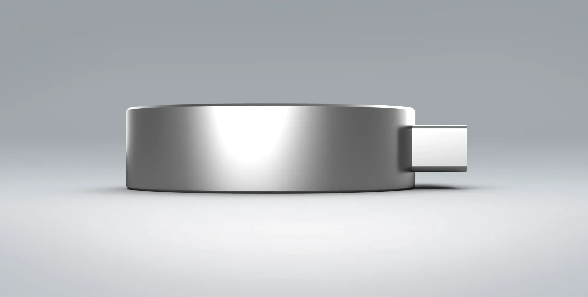 Side view of the TC4 bi-directional pancake load cell on a grey background