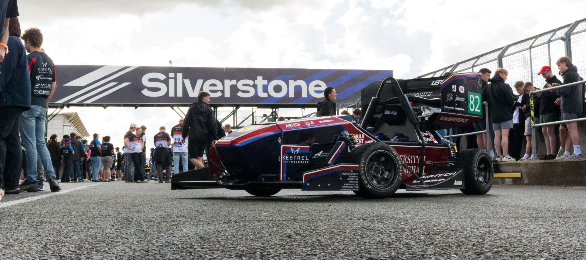 UBRacing's Formula Student race car on the tarmac at Silverstone Race Circuit.