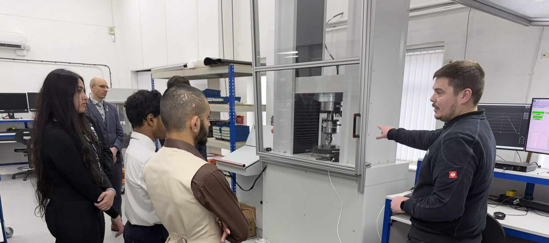 A single compression load cell being calibrated to UKAS 17025 in a test rig.