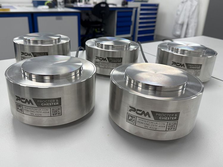 Five CNC compression load cells used in aerospace for Lloyds Beal