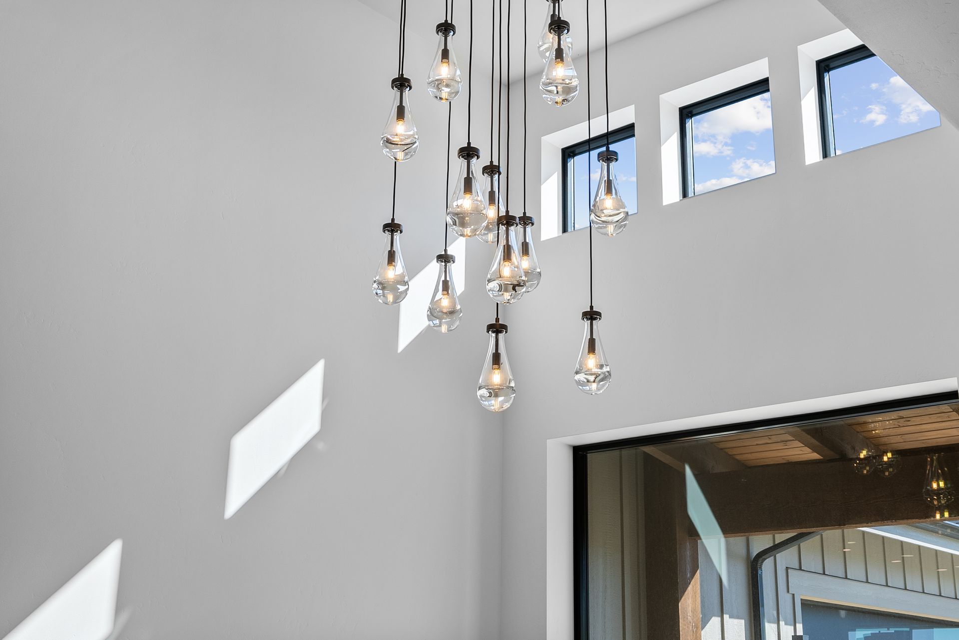 A room with a lot of lights hanging from the ceiling.