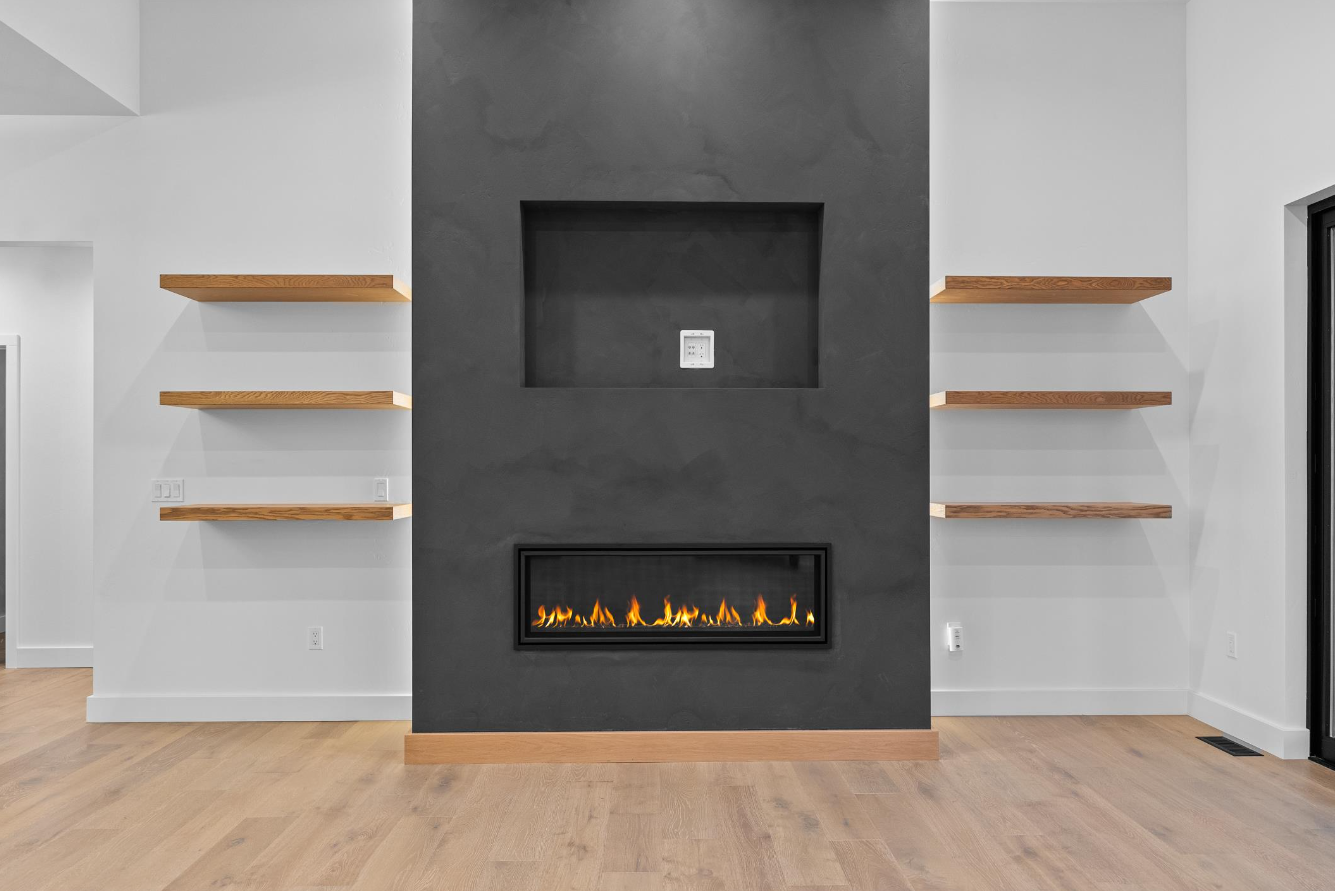 There is a fireplace in the middle of the room.