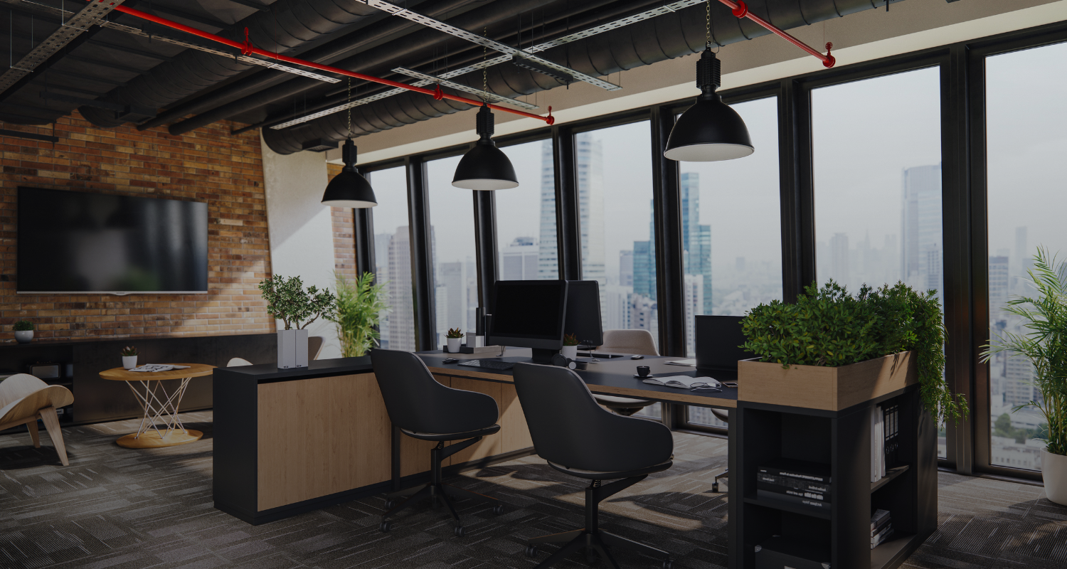 Modern office interior with large windows, city view, and desk with computers.