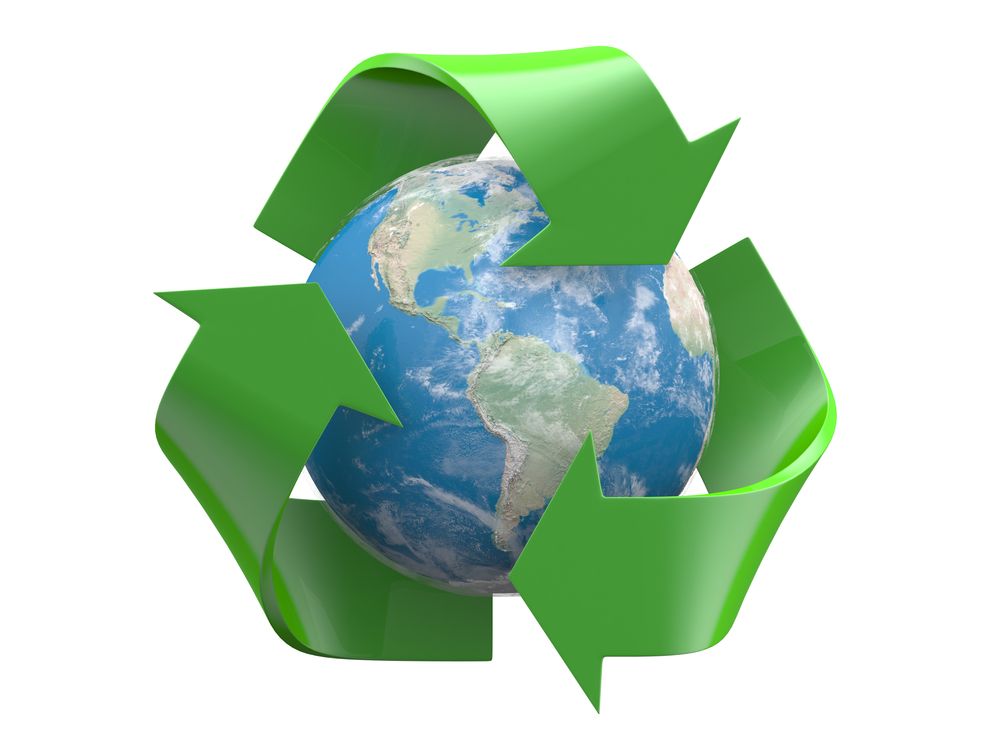 A recycling symbol around a globe on a white background