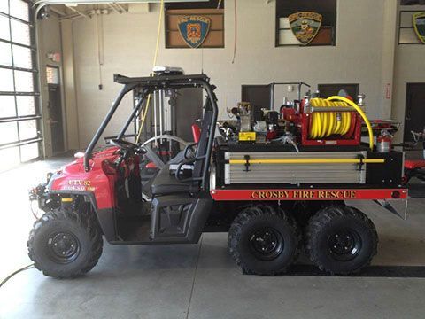 A red utility vehicle with the words Crosby fire rescue on the side