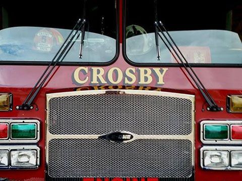 The front of a red crosby fire truck
