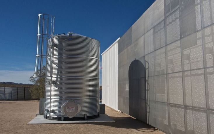 Shipping Container Modification with a Water Tank- Off Grid