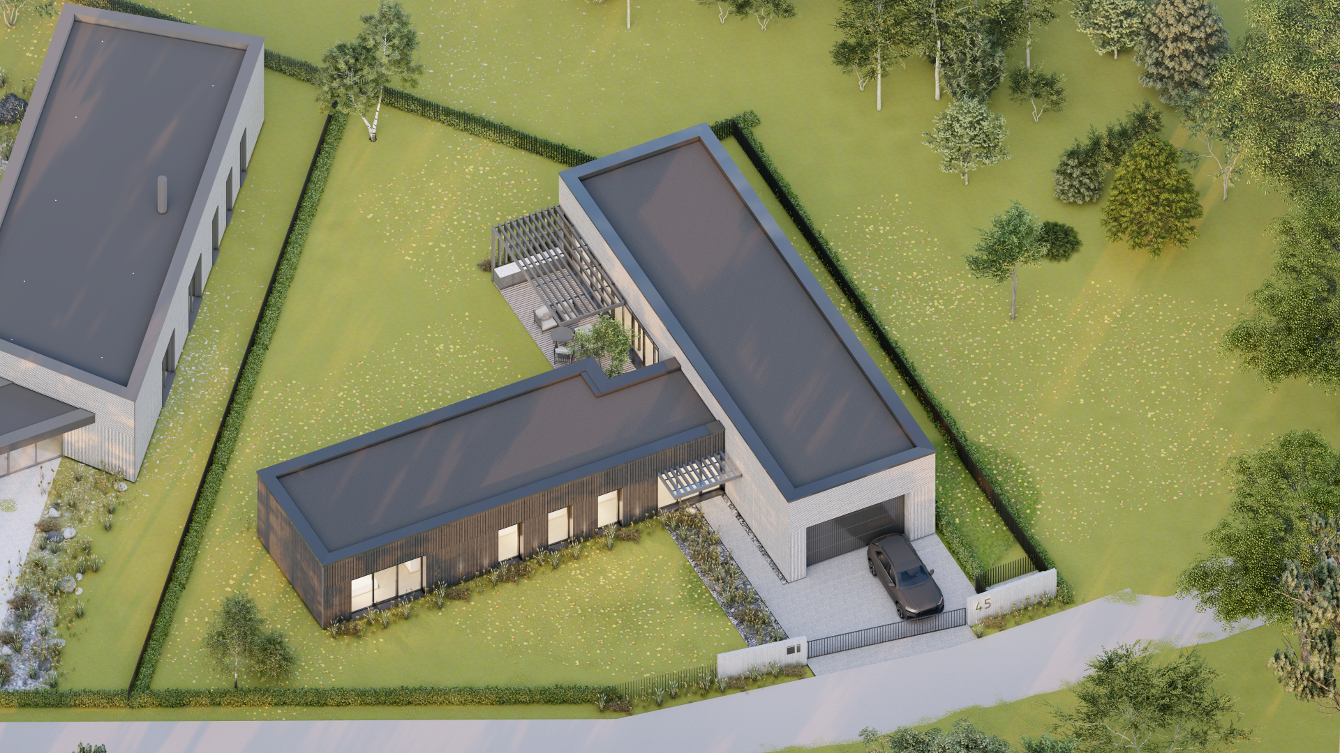 Namo vaizdas iš oro, o priešais jį pastatytas automobilis.