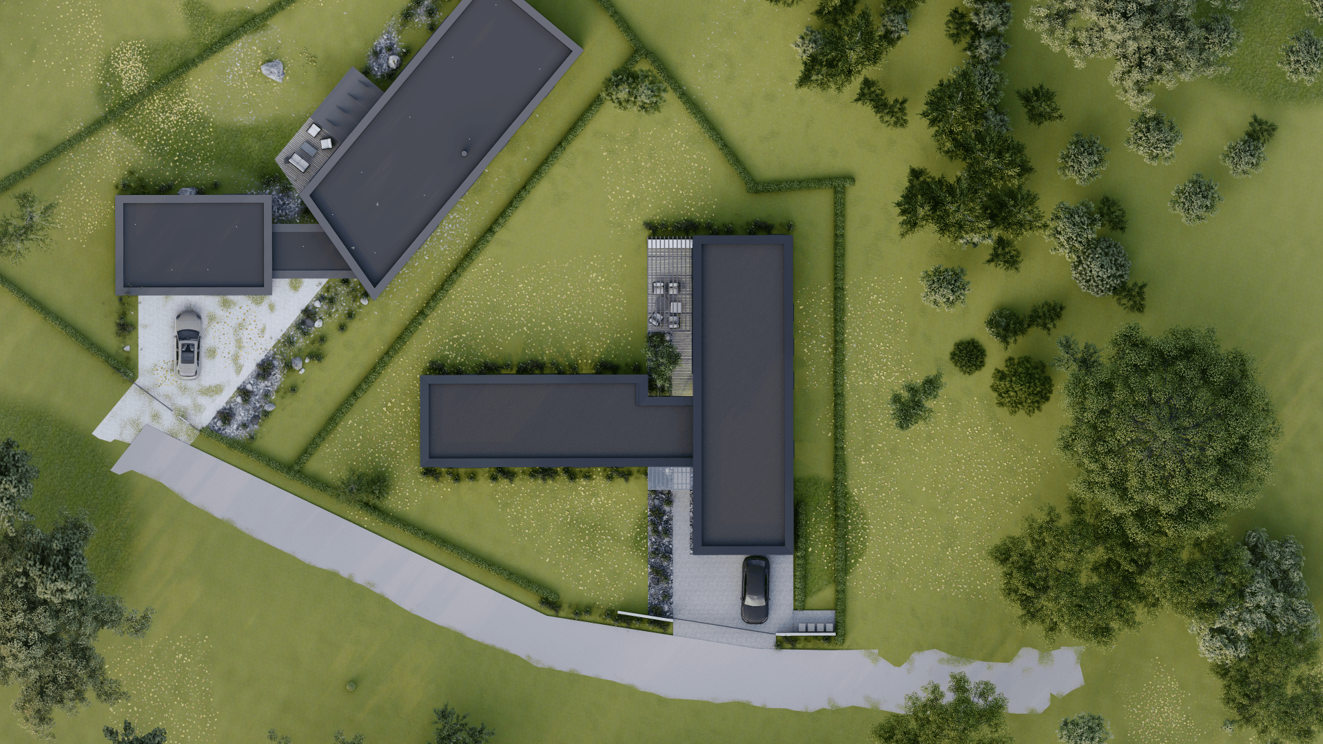 Namo, apsupto medžių ir žolės, vaizdas iš oro.