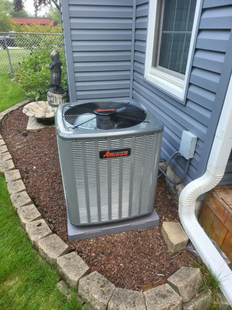 Man Is Sitting On The Ground - Saint John, IN - Elite Comfort Heating And Air Conditioning LLC