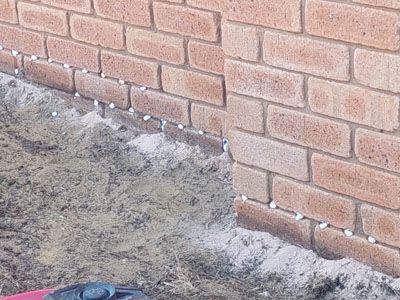 Damp proof course injection