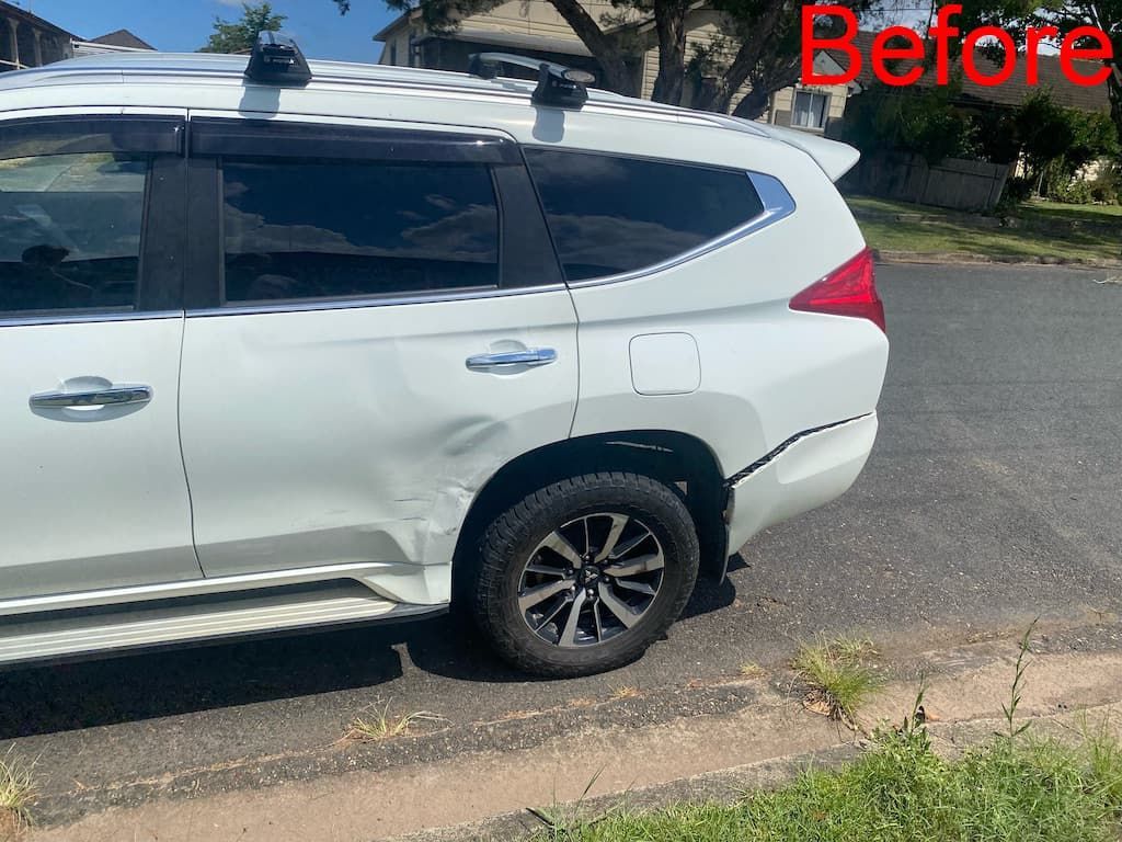 White SUV With Damaged Rear Fender — Car Restoration in Taree, NSW