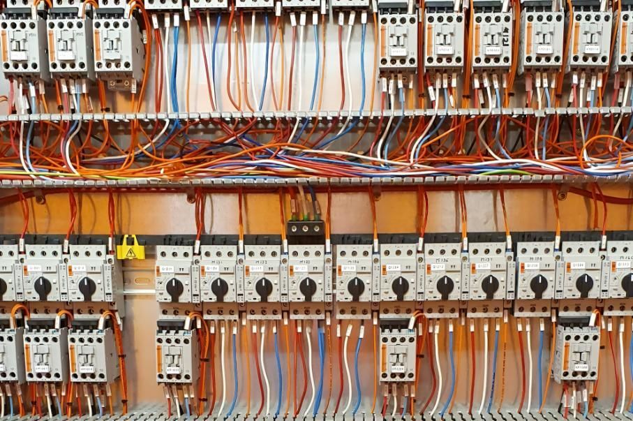 A Close Up of a Electrical Panel With a Lot of Wires Coming Out of It — Reilly Electrical Services in Maroochydore, QLD