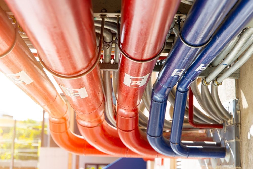 Red and Blue Pipes Running Along the Ceiling — David McNeill Plumma (Gas Specialist) In Cessnock, NSW