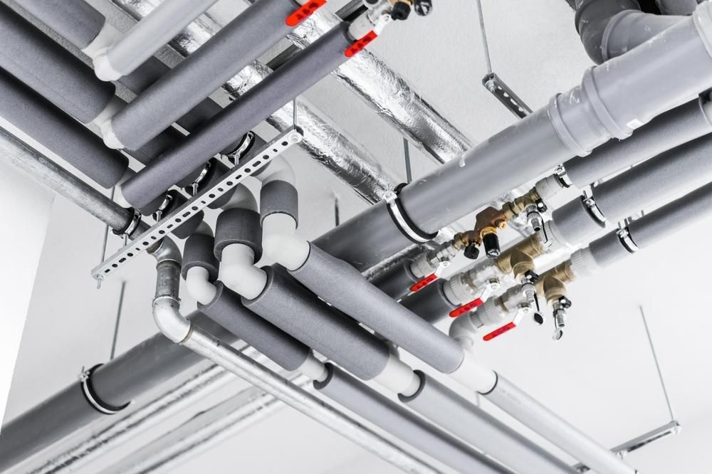 Gray Pipes and Fittings Crisscross the Ceiling — David McNeill Plumma (Gas Specialist) In Cessnock, NSW