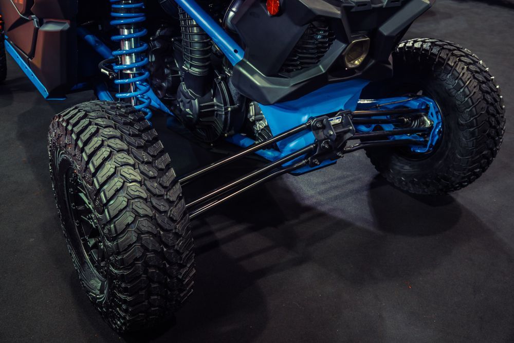 Close-up of a Blue and Black All-terrain Vehicle — Cairns Tyre Specialists In Cairns City, QLD