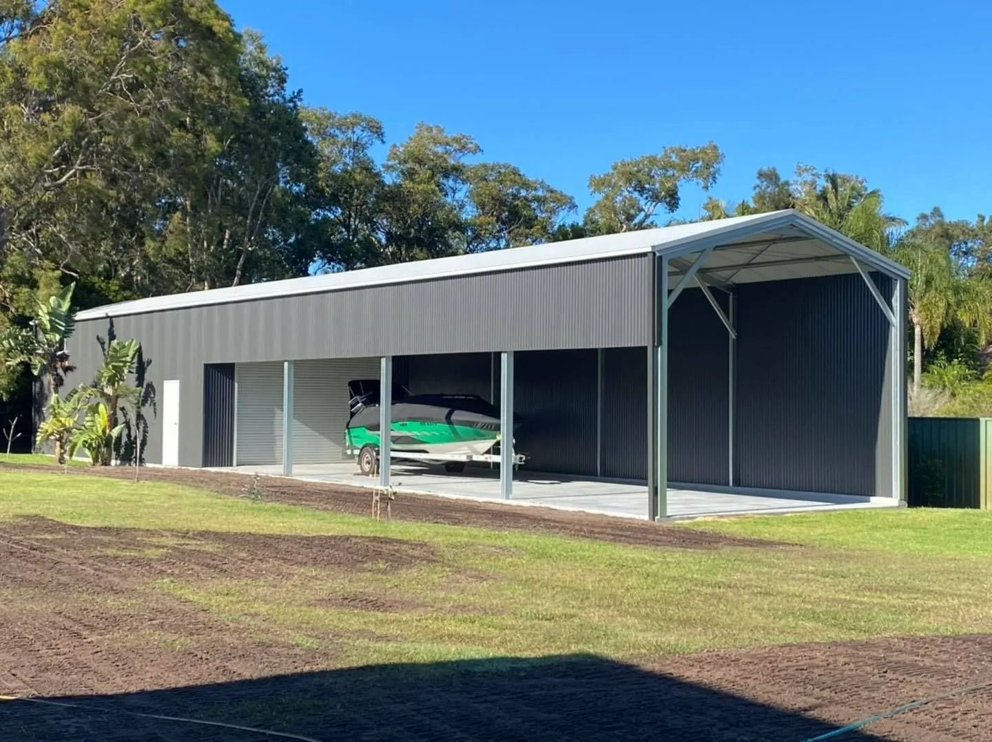 Gray Metal Shed with Attached Carport — Fair Dinkum Builds Port Stephens in Bobs Farm, NSW
