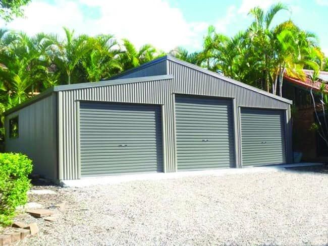 Three-Bay Gray Corrugated Steel Garage with Roll-Up Doors — Fair Dinkum Builds Port Stephens in Bobs Farm, NSW