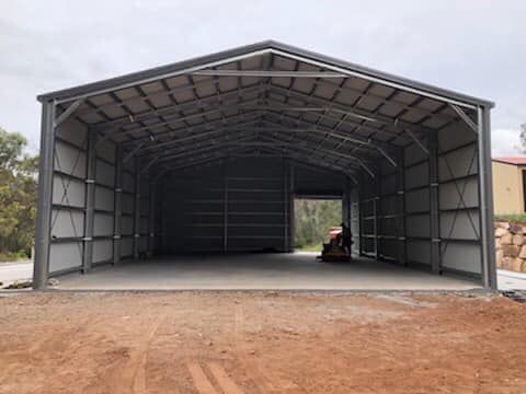 Large, Open Metal Shed with Concrete Floor and Gravel Yard — Fair Dinkum Builds Port Stephens in Bobs Farm, NSW