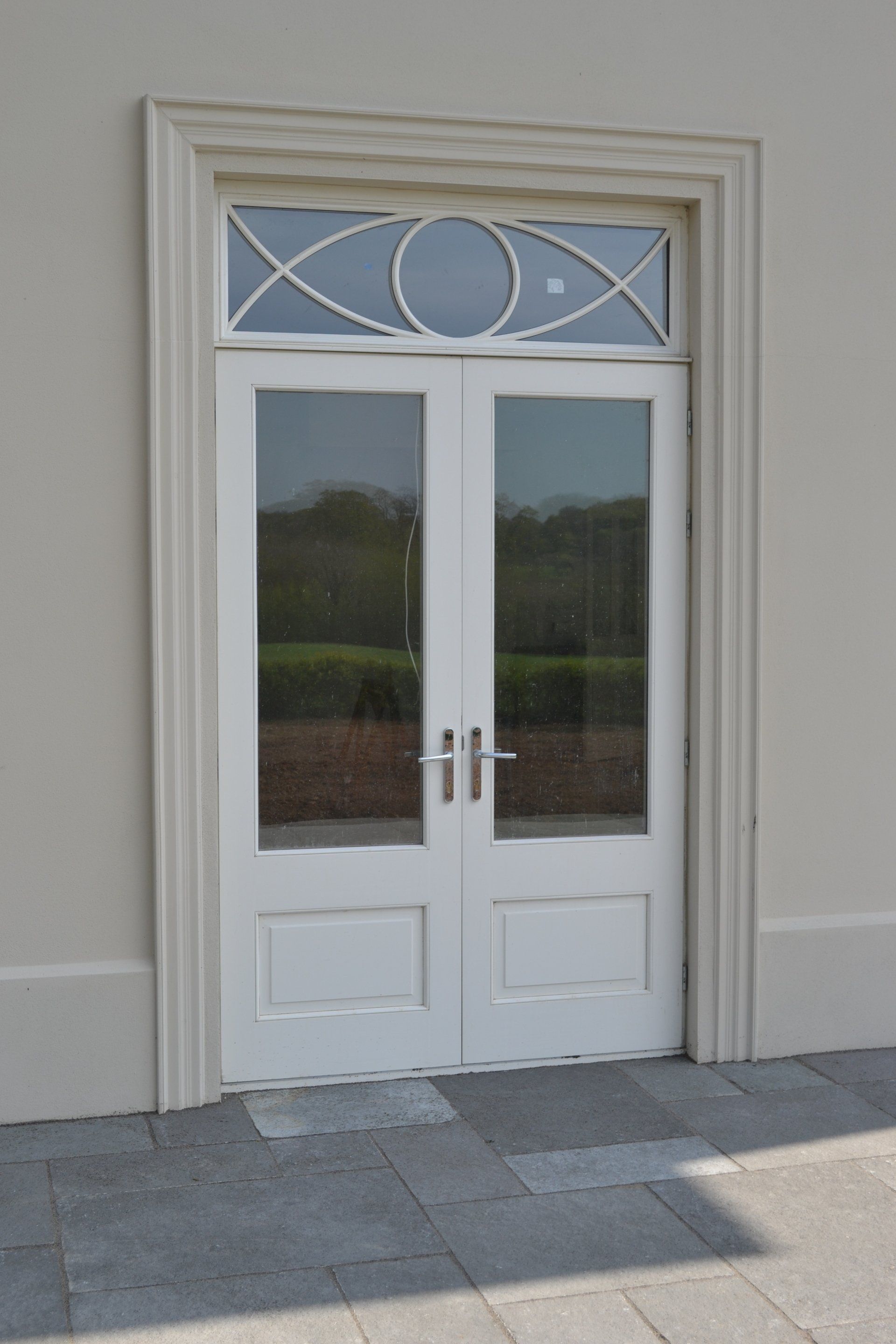A white door with a window above it