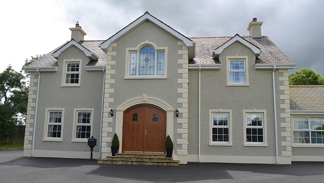 A large house with a lot of windows and doors