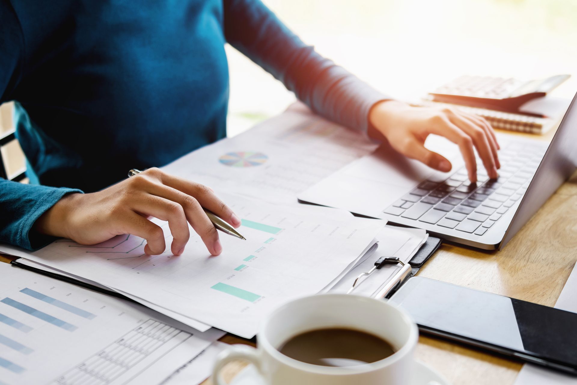 A woman is going over some numbers.