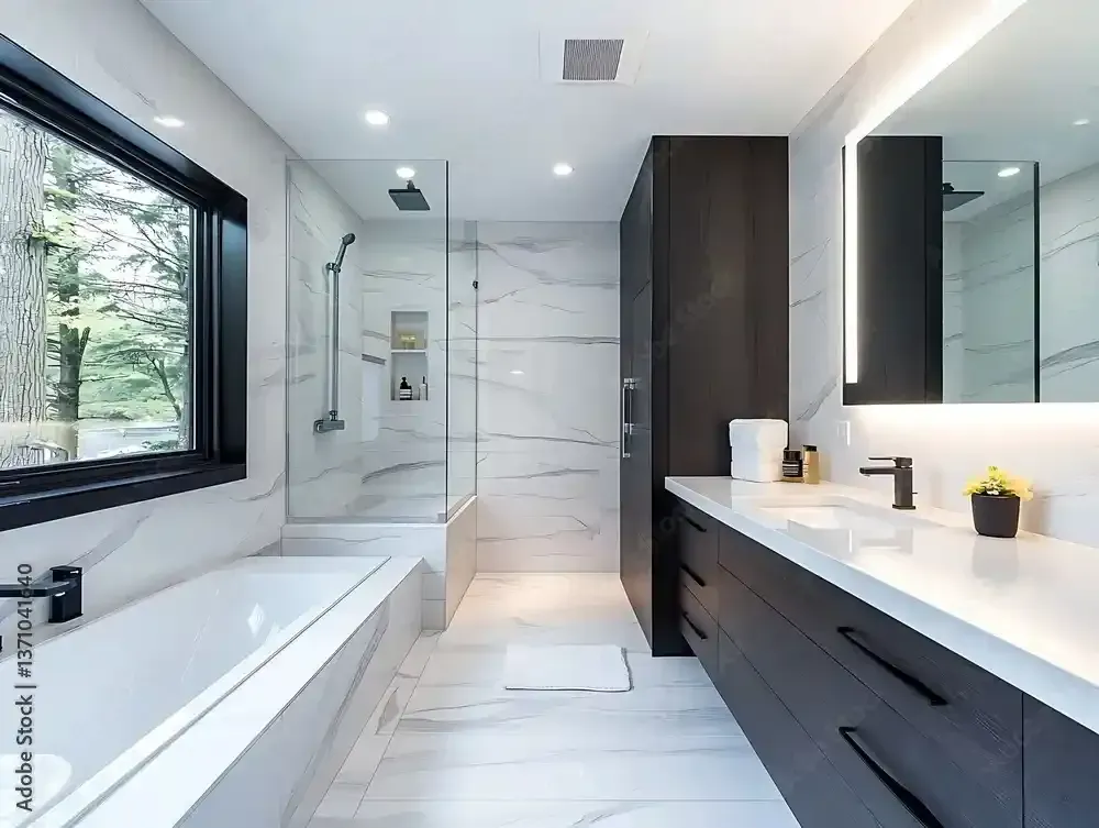 A plumber is laying on the floor working on a sink.