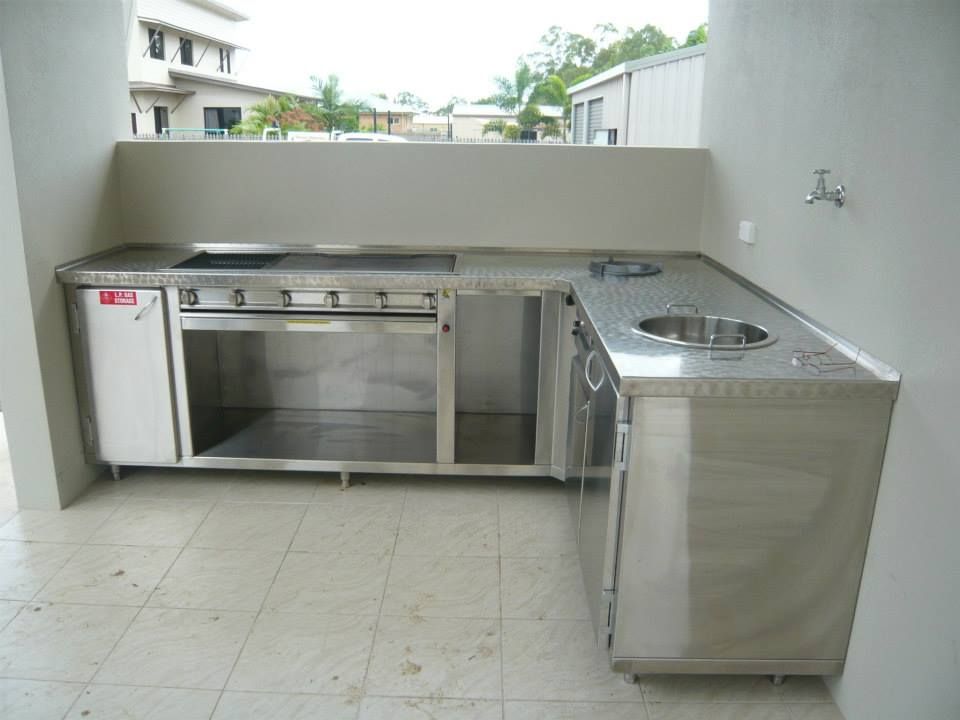 A Kitchen With Stainless Steel Appliances and a Sink — Townsville Stainless Steel in Garbutt, QLD