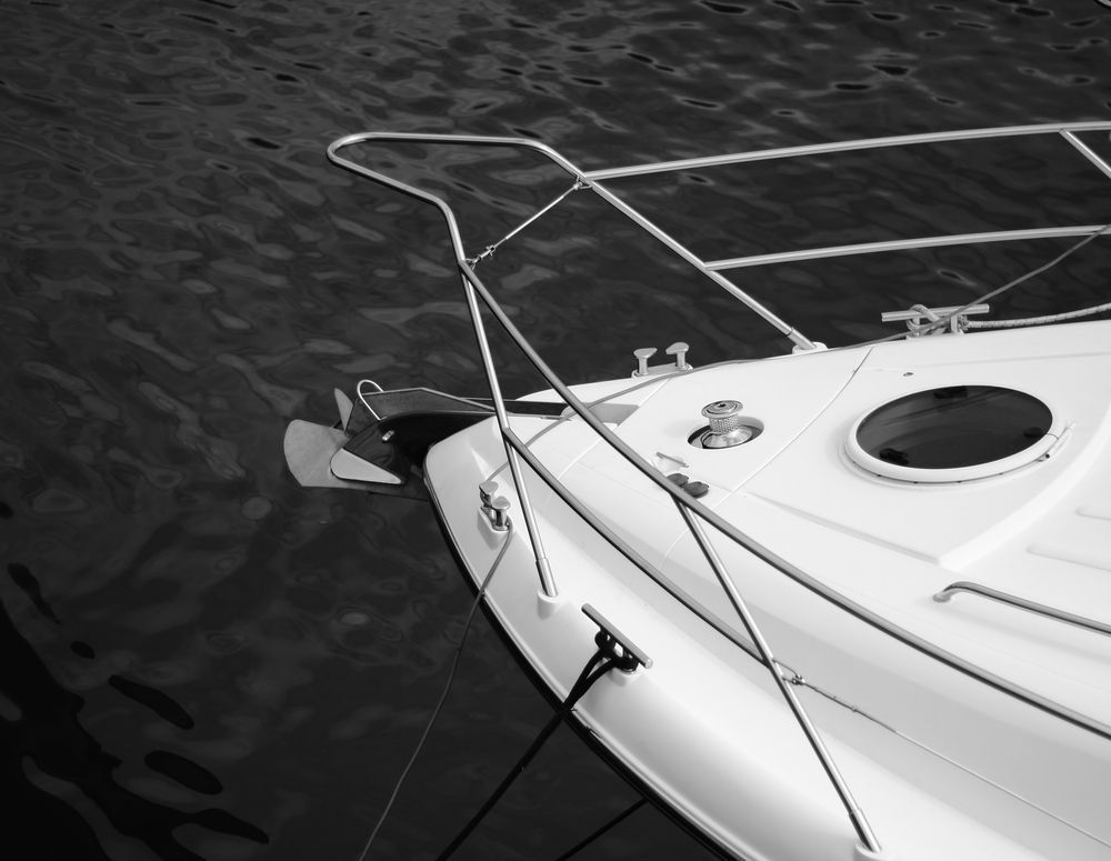 Black and White Photo of the Front of a White Boat on Water — Townsville Stainless Steel in Garbutt, QLD