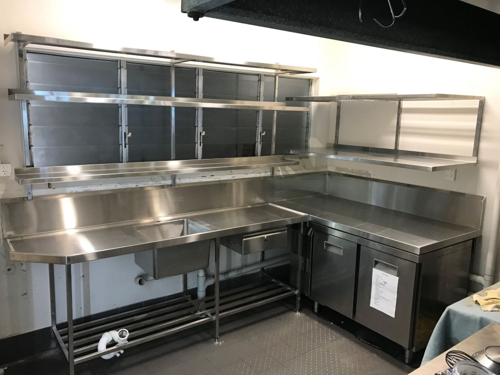 A Kitchen with Stainless Steel Appliances and A Sink — Townsville Stainless Steel in Garbutt, QLD