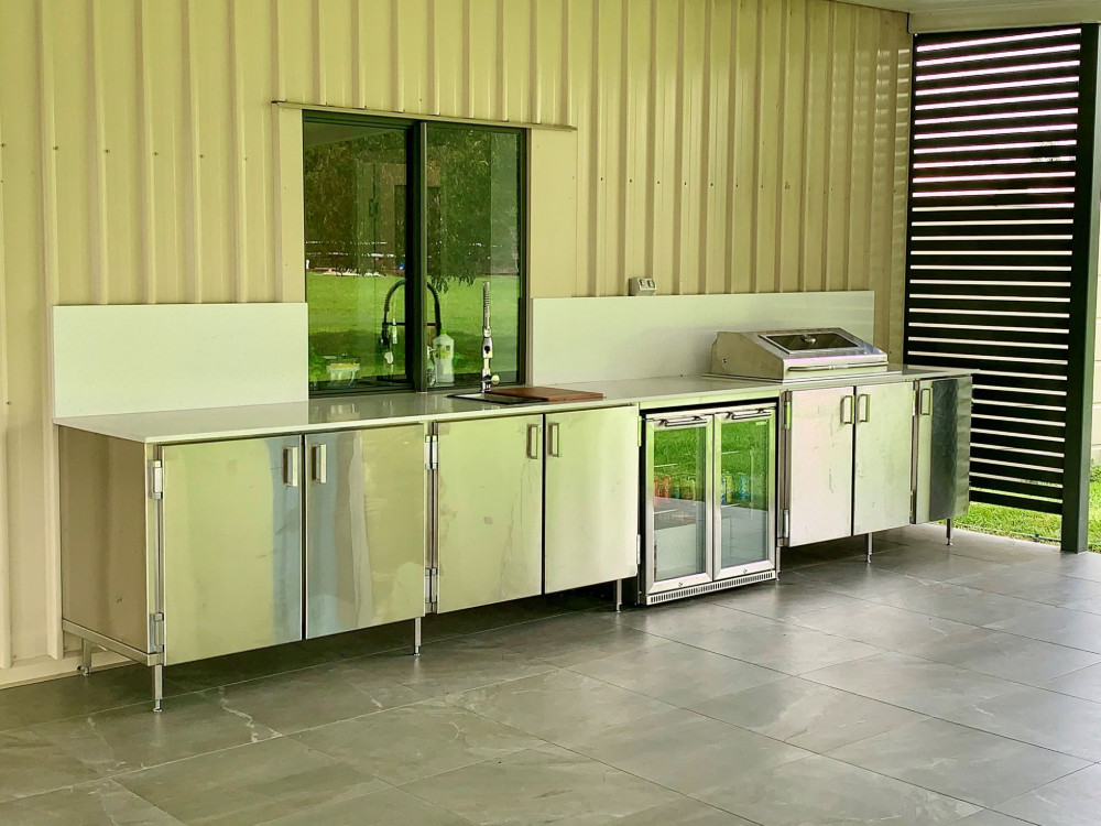 A Stainless Steel Sink Is Sitting on Top of A Stainless Steel Counter — Townsville Stainless Steel in Garbutt, QLD