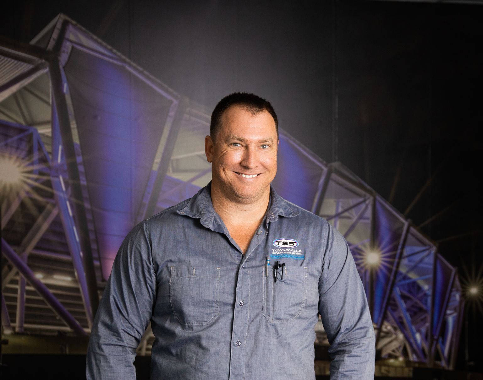 A Large Kitchen with Stainless Steel Appliances and Shelves — Townsville Stainless Steel in Garbutt, QLD