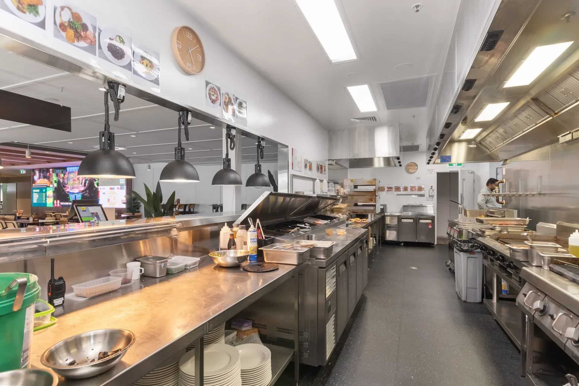 Commercial Kitchen With Stainless Steel Counters — Townsville Stainless Steel in Garbutt, QLD