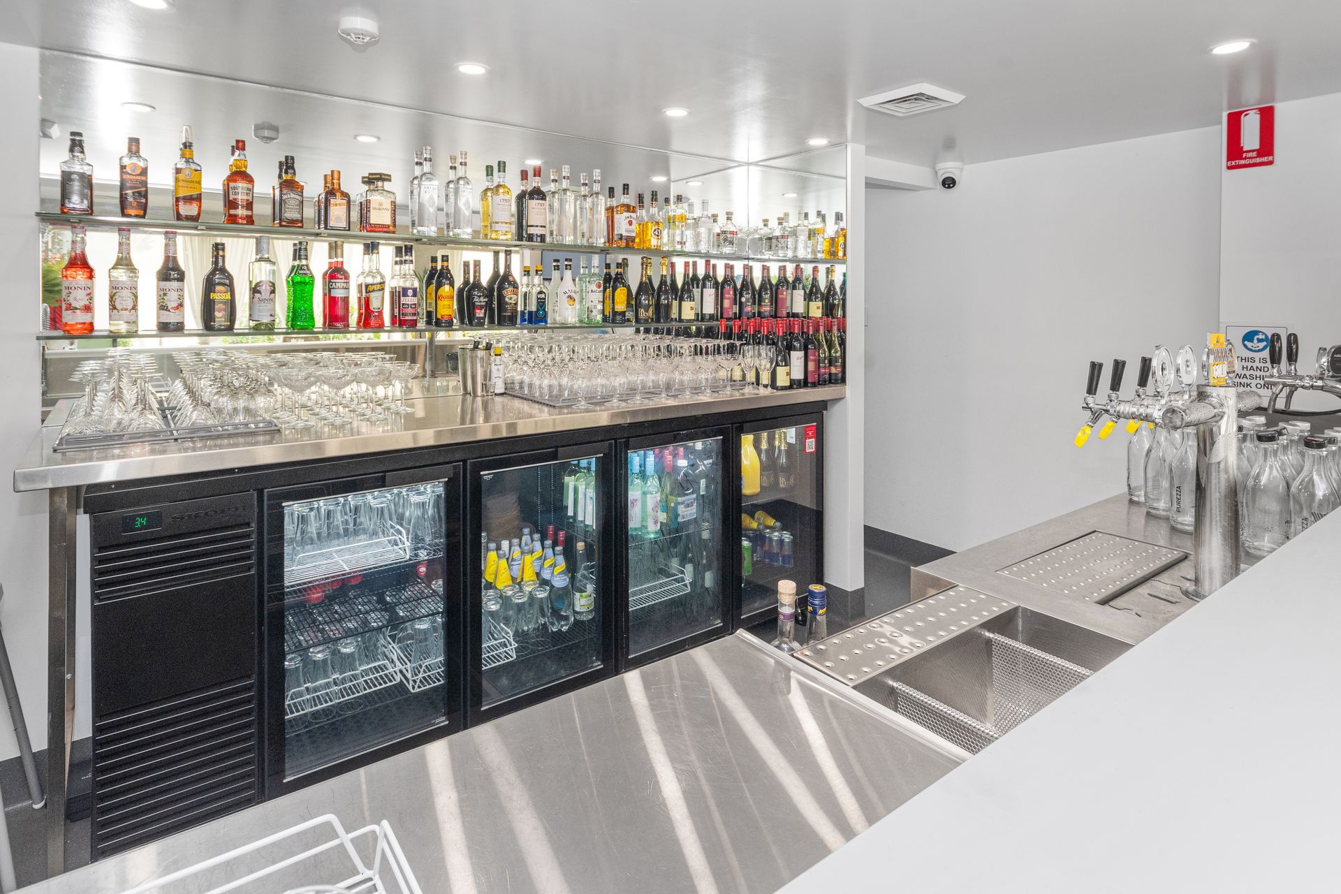 A Well-stocked Bar With Stainless Steel Counters — Townsville Stainless Steel in Garbutt, QLD