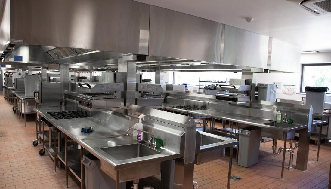 Commercial Kitchen with Steel Tables and Sinks — Townsville Stainless Steel in Garbutt, QLD