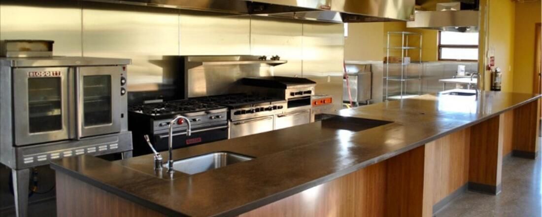 A Kitchen with Stainless Steel Appliances and A Sink — Townsville Stainless Steel in Garbutt, QLD