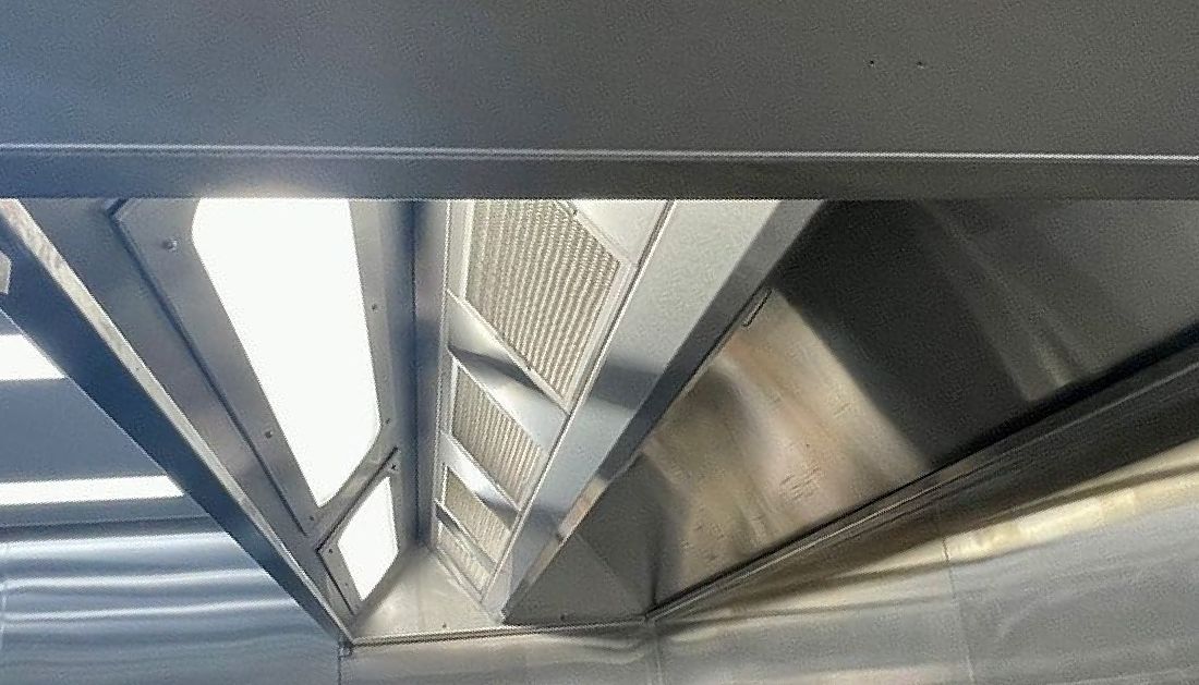 A Close up Of a Stainless Steel Exhaust Hood in A Kitchen — Townsville Stainless Steel in Garbutt, QLD