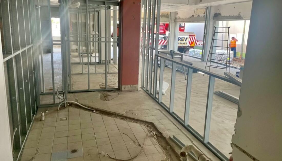A Building Under Construction with A Lot of Windows and A Hole in The Floor — Townsville Stainless Steel in Garbutt, QLD
