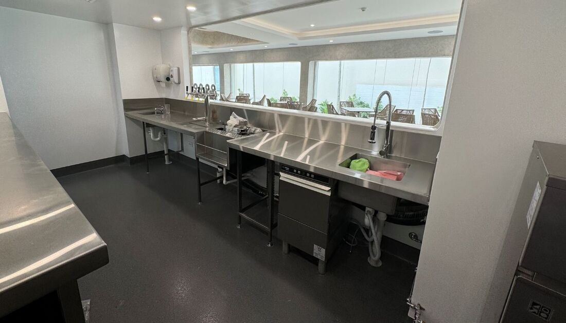 A Kitchen with Stainless Steel Counter Tops and Sinks — Townsville Stainless Steel in Garbutt, QLD